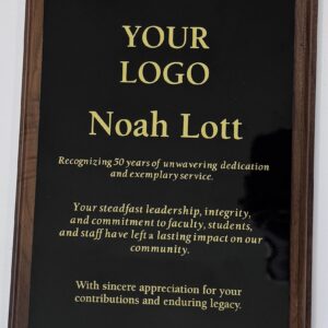 Wooden plaque with an engraved metal plate